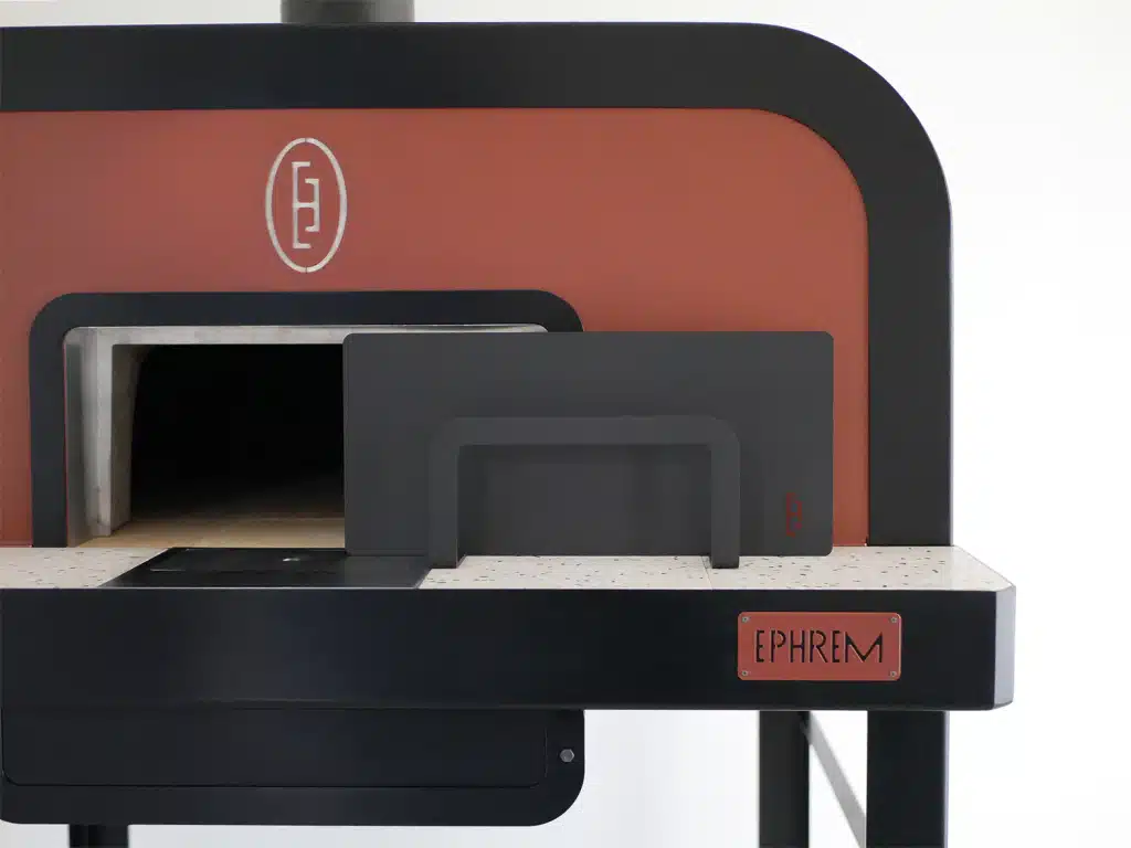 Flambeur 120 Ephrem wood-fired oven open front and door hearth and terrazzo